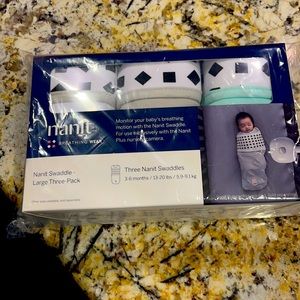**NEVER BEEN OPENED** brand new Nanit swaddles